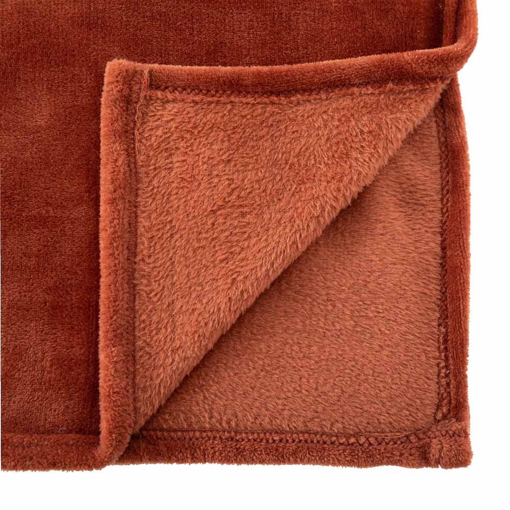 atmosphera-flannel-polyester-blanket-terracotta-orange-130cm-x-180cm