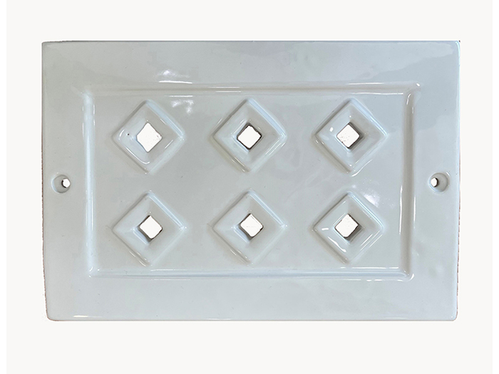 ceramic-glazed-vent-with-6-diamond-shaped-holes-in-white
